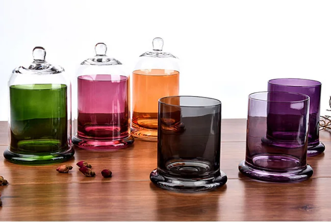 Colored glass cloche candle jars with matching dome lids