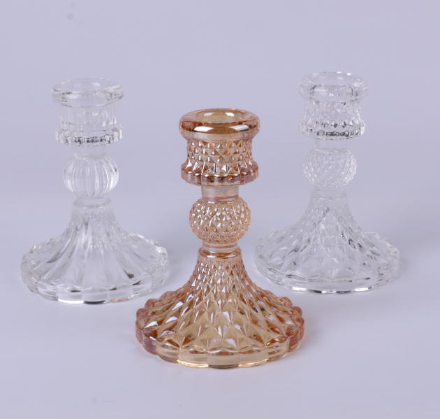 clear and amber pressed glass candlestick holders